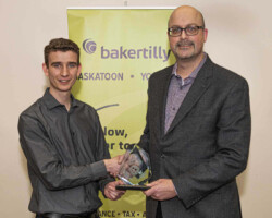 Brett Guenther from BMO Bank of Montreal presents the Business Growth & Expansion Award to Grain Millers Canada