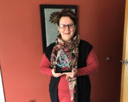 Phoebe Buckle from Under the Covers with her Award of Excellence sponsored by Parkland College